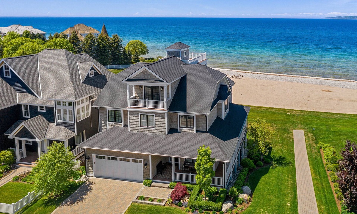 Bay Harbor House | Lake-view luxury awaits at Serenity North 4 in Bay Harbor, MI, with 4 bedrooms.