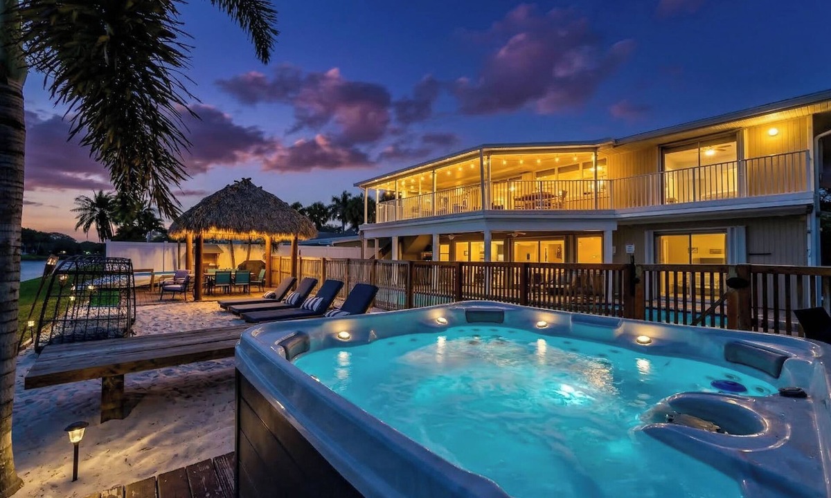 Hunt Club Villa | Waterfront Beach Villa Pool, Cinema, Game Room and Tiki