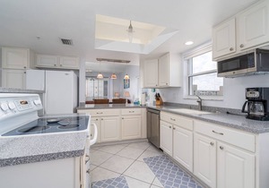 Corner Unit Top Floor | Bay Views, Pool & Walk to Beach Access in Fort Myers Beach