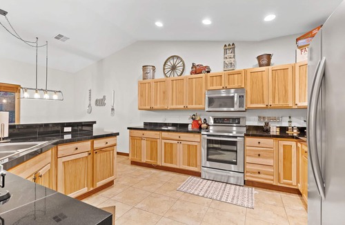 Ronald House | 5-star family home with game room, private hot tub, summer pool, near the lake!