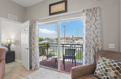 Madeira Beach Condo | 🌅 Madeira Bay Resort #210 – Corner Marina-View Condo with Pet-Friendly Luxury