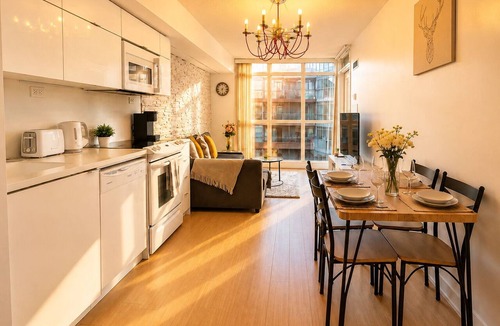 CityPlace Apartment | Spacious 1 + Den Condo near CN Tower | Parking