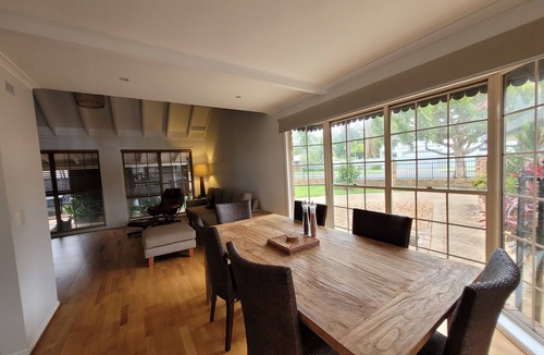 Mooloolaba House | Sunny Spacious Canal Home - pool, kayaks, beach