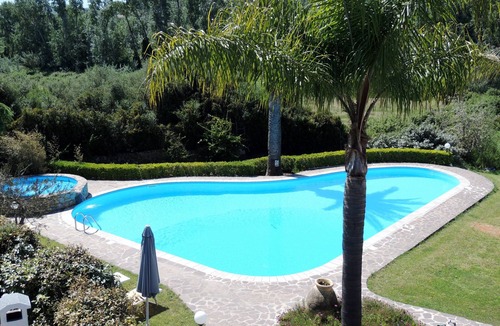 Alghero Villa | Villa Donzell, 14m private pool and Jacuzzi, Large Garden, Kids Play Area