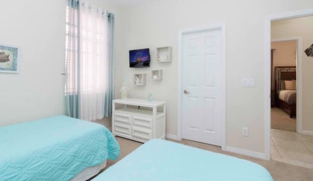 Astonishing FOUR-Bedroom Villa near Disney! in Kissimmee