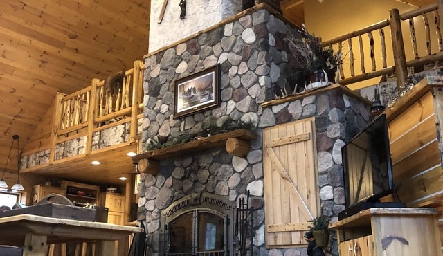 Beautiful spacious secluded log home located feet from ATV/snowmobile Trails in Trego