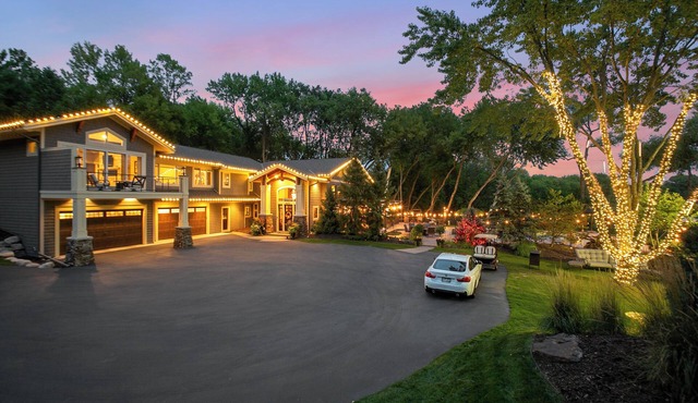 Private Grand Lodge with pool, lake & pickleball courts in Chanhassen