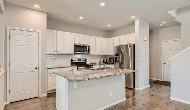Spacious Newer Home, features 3 beds and 2.5 baths in Denver