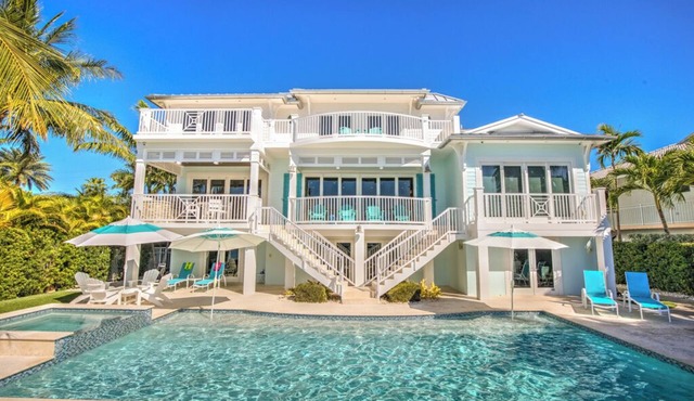 The Sea Glass House~LUXURY Oceanfront Estate~Pool Dock Views Jacuzzi Game Room FirePit Office More! in Marathon